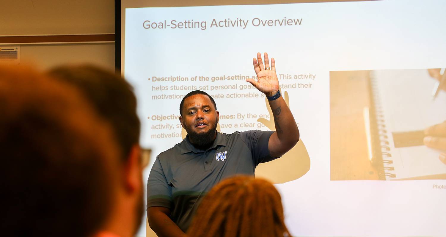 Dr. Barry Hall II presenting during his Smart Goals class during College Prep Week